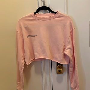 Cropped rose quartz pink organic cotton Pangaia sweatshirt